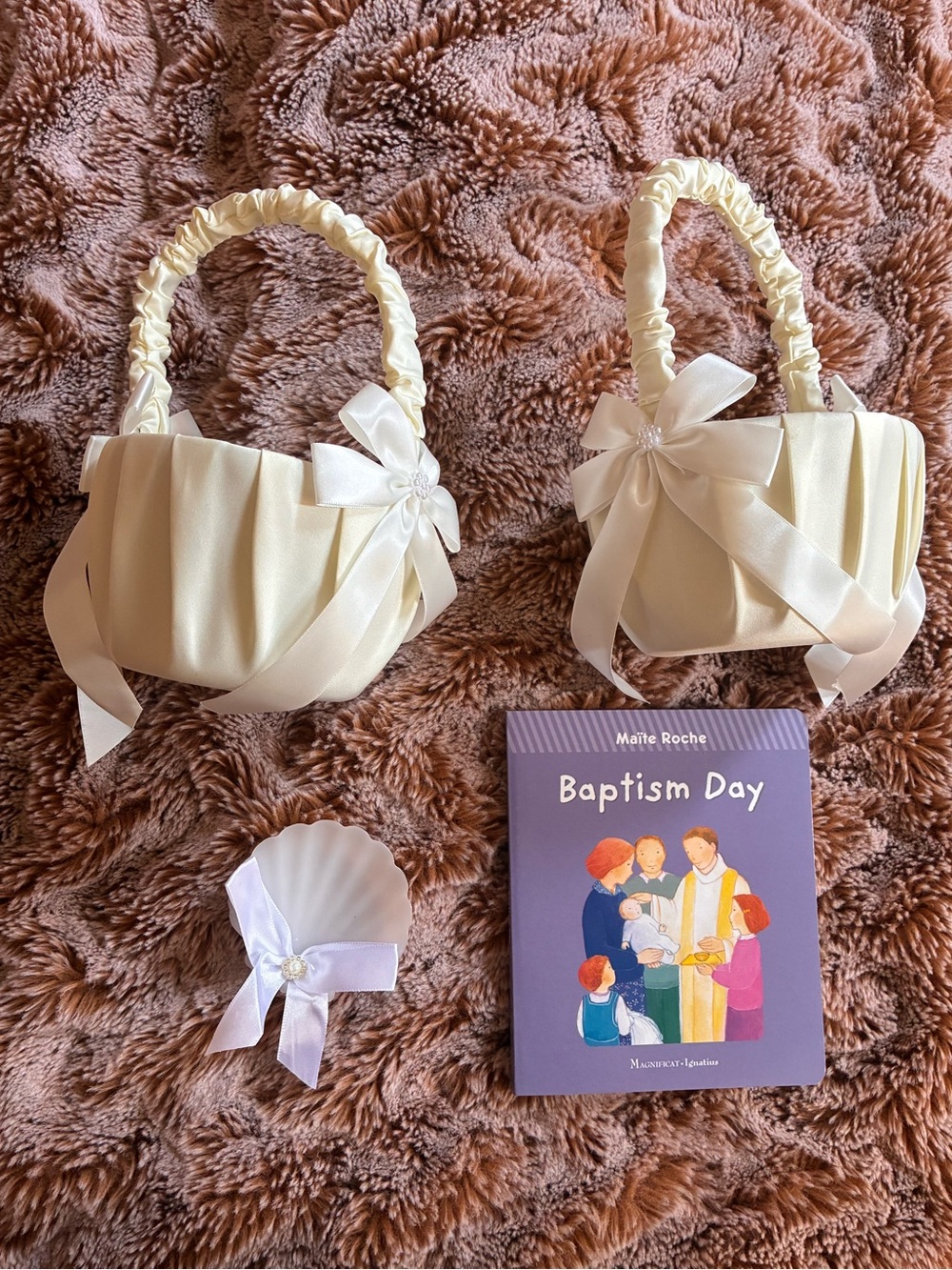 Like new baptism bundle- includes 2 satin baskets, baptism shell & baptism book